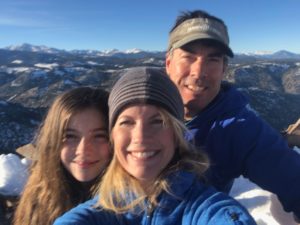 Photo of Greg Johnson with two family members