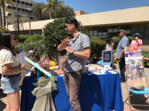 Religious Studies professor William Elison speaking to a student at Spring Insight 2018.