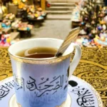 Image of a tea cup with Arabic calligraphy
